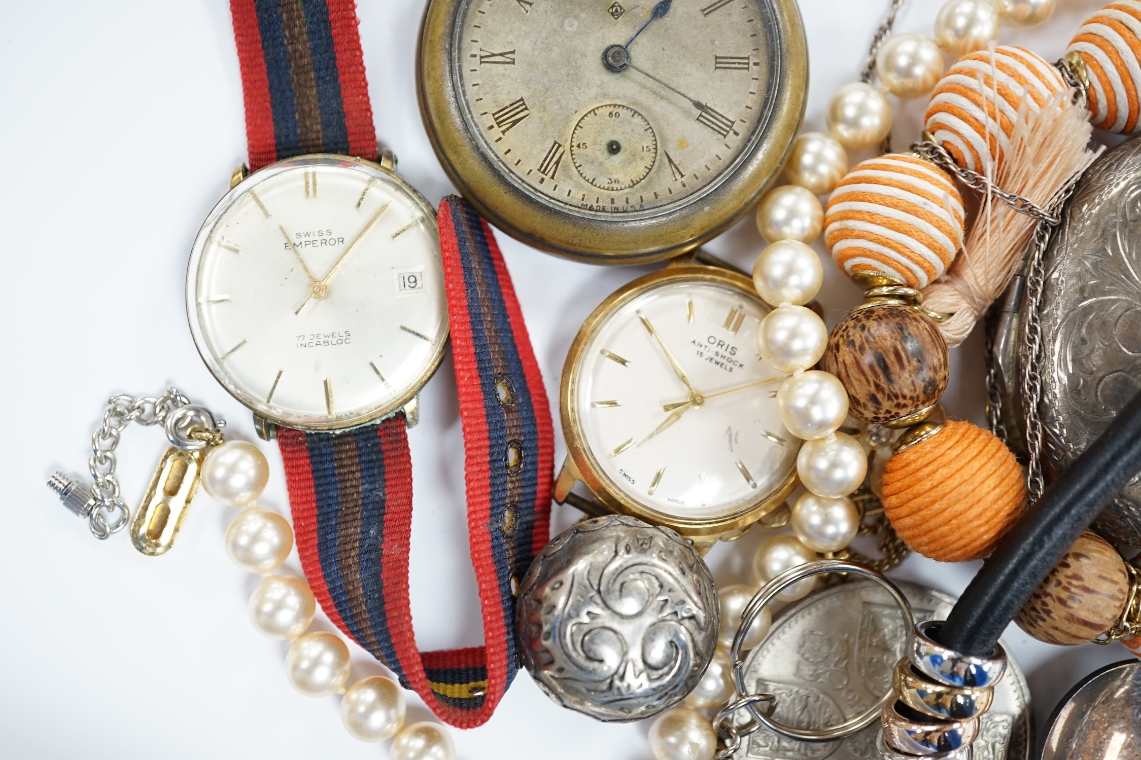 A quantity of assorted costume jewellery and other items including wrist watches, pocket watches and coins.